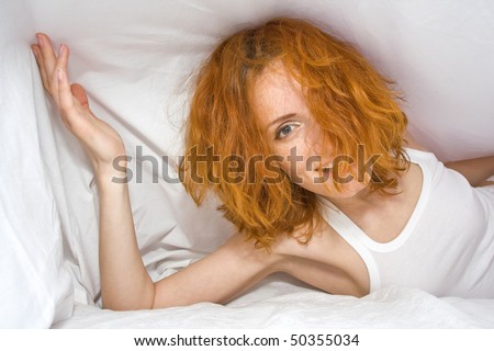 Good morning. Dishevelled woman in white bed