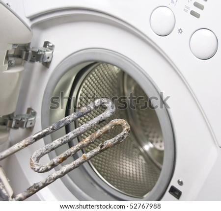 Washing machine and damaged electric heater