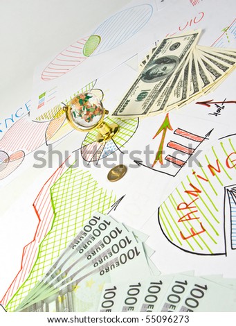 Business diagrams, glass globe and money