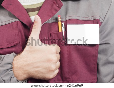Close-up of blank name tag and service man uniform and thumbs up sign