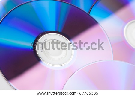 Close-up view of colorful CDs. Diagonal view