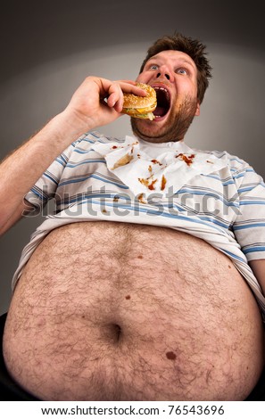 stock photo Portrait of expressive fat man eating burger