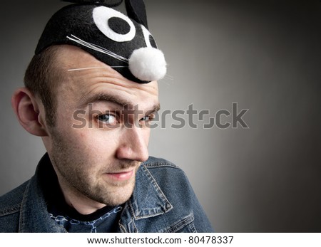 Portrait of funny man in rabbit hat