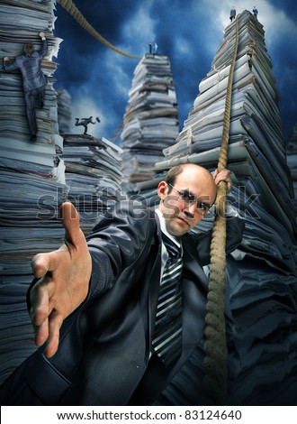Serious businessman inviting you to climbing up the pile of paperwork