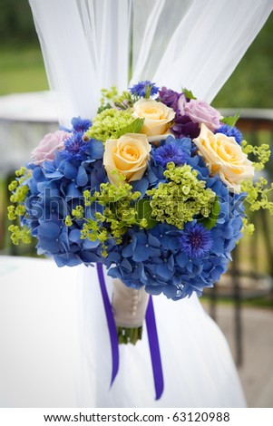 Bridal bouquet made from multi-colored flowers
