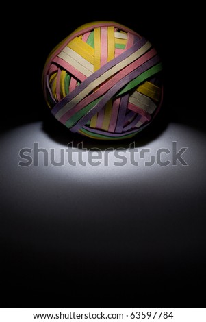 Rubber band ball in a tight spotlight