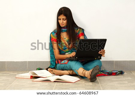 Young Asian student woman. Over white background
