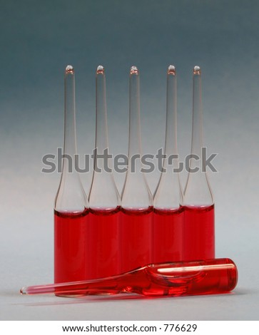 Ampoules with a red liquid