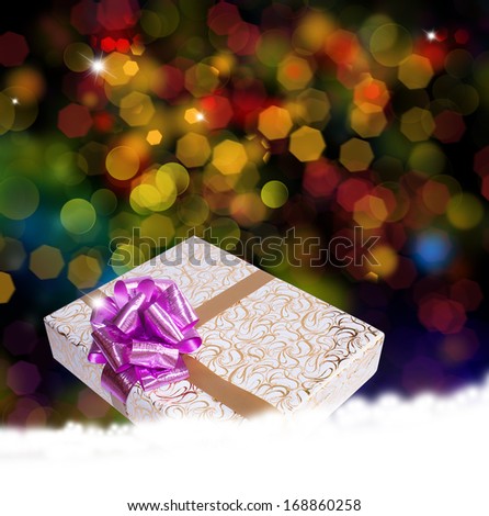 New Year Holiday.Christmas.Gift boxes on a bright abstract background