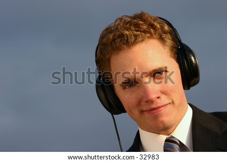 business man with headphones
