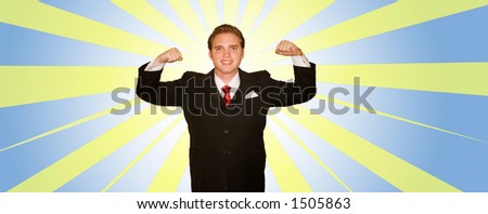 Business Man stands in a power pose with his arms above his head while wearing a black suit and red tie