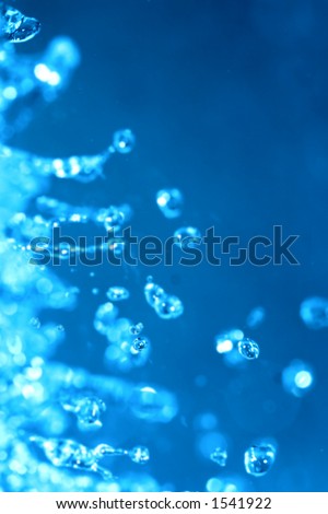 Blue, refreshing water and water drops