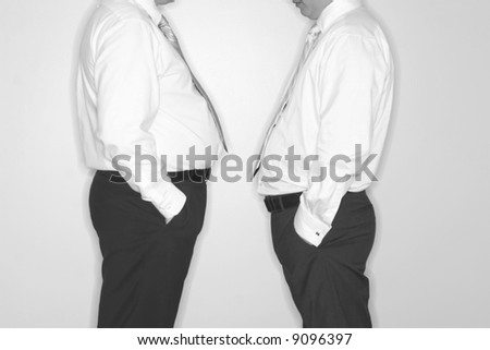 front view of two businessmen standing facing each other