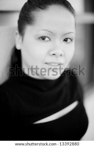 Closeup of young asian woman wearing black clothing