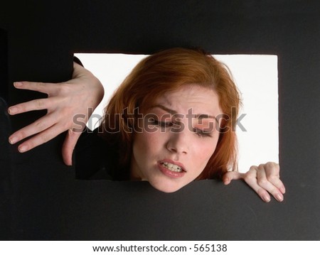 WeIrd image of a woman in a box