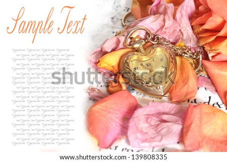 old pocket watch in a vintage romantic letter