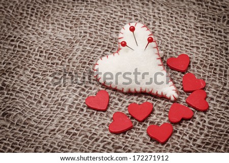 Valentine background with hand-sewn hearts
