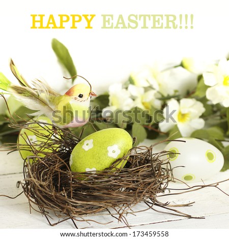 Easter decoration: bird and egg in a nest