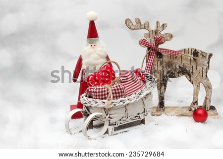 Christmas Reindeer and Santa on wooden background in scandinavian style