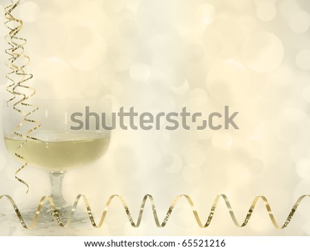 Glasses of champagne with gold ribbon