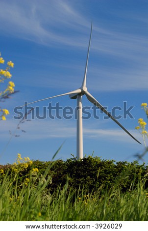 alternative energy source. wind turbine in a rural landscape.