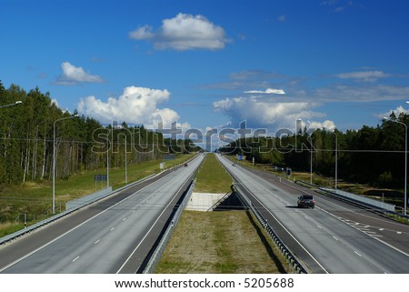 Two directions of asphalt in the srteet.