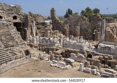 The ruins of the ancient amphitheater. Turkey, Side. Amid the ruins - ancient columns.
