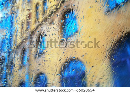 Window with raindrops. Abstract background.
