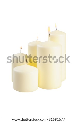 Five large lighted candle. Isolated on white.