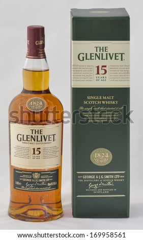 KIEV, UKRAINE - AUGUST 26, 2012: The Glenlivet single malt Scotch whisky 15 years of age against white. Distillery was founded 1824 and now it is the biggest selling single malt whisky in the US.