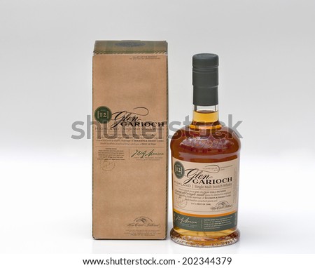 KIEV, UKRAINE - JUNE 29, 2012: Bottle and box of 12 years old single malt scotch whisky Glen Garioch against white. It is one of the oldest whisky distilleries in Scotland owned by the company Suntory