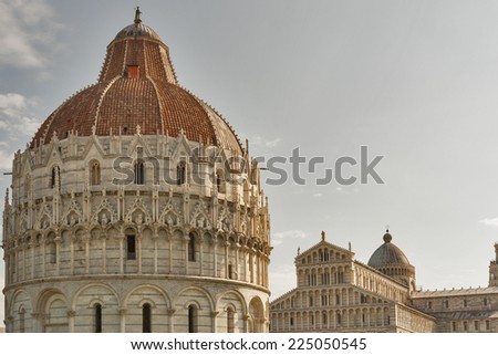 The Pisa Baptistryand cathedral Duomo on Square of Miracles, Tuscany, Italy. A UNESCO World Heritage Site.