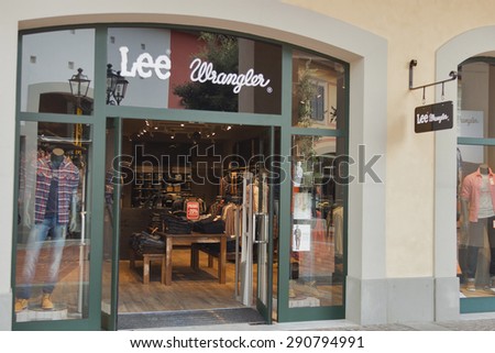 MUGELLO, ITALY - SEPTEMBER 11, 2014: Facade of Lee Wrangler store in McArthurGlen Designer Outlet Barberino. Wrangler is an American manufacturer of jeans and other clothing items founded in 1940s.