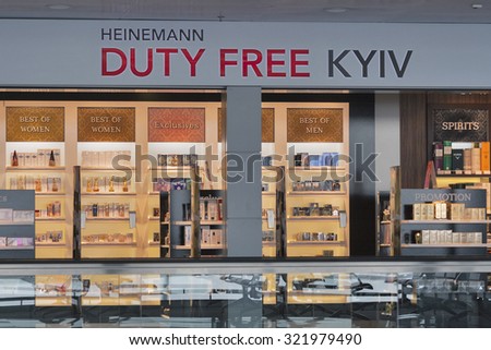 KIEV, UKRAINE - FEBRUARY 08, 2015: Heinemann Duty Free shop display in Kyiv Boryspil International Airport. Duty free shops are retail outlets that are exempt from the payment of certain taxes.