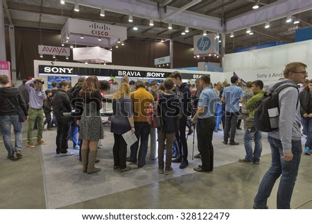 KIEV, UKRAINE - OCTOBER 11, 2015: People visit Sony Bravia, electronics manufacturer company booth during CEE 2015, the largest electronics trade show of Ukraine in ExpoPlaza Exhibition Center