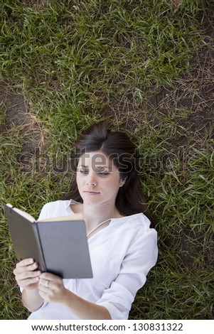 Beautiful latin woman loves reading