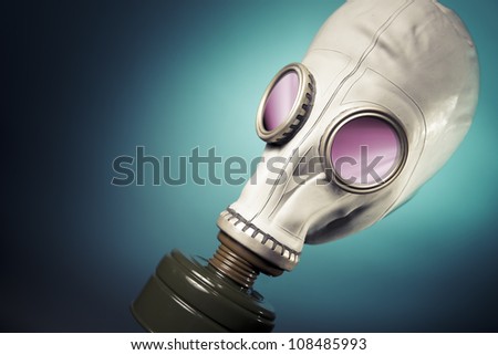 high contrast image of a gas mask and smoke