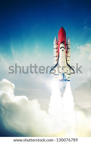 Space shuttle taking off on a mission
