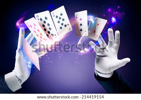 Magician hands with magic cards