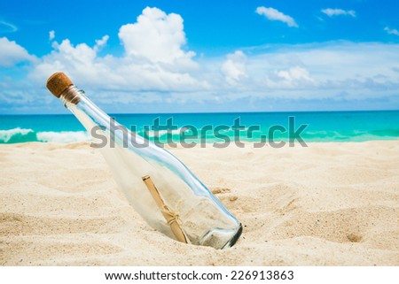 Message in a bottle on a shore