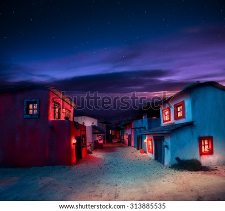 scale model of a mexican town at twilight