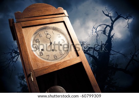 dark antique clock at Halloween night