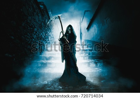 High contrast image of the grim reaper in a ghost town with a scythe