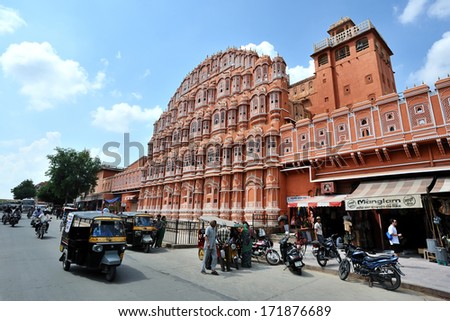 Jaipur, India - September 23, 2013: people gather on the street for business in front of Hawa Mahal. also called Palace of Wind or Palace of Breeze, built in 1798, Jaipur, Rajasthan, India.