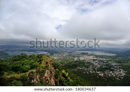 city of Udaipur, Rajasthan, India, seen from Monsoon Palace, on the top of the mountain. the palace has been built in 1884, Mewar Dynasty, basically for watching the monsoon clouds.