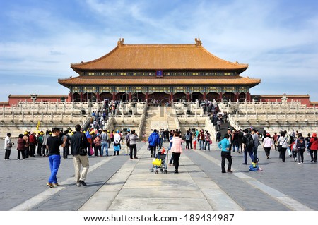 Beijing, China - April 20, 2014 :tourists are visiting the Hall of Supreme Harmony in the Forbidden City. The Palace Museum was built in 1406-1420, served as imperial palace. UNESCO World Heritage.