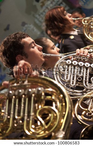 TORREVIEJA, SPAIN - APRIL, 02 : Musicians play religious marches on horn during Holy Week on April 2,2012 in Torrevieja, Spain. Tradition hundreds of years, typical in Spain.