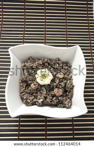 Black Rice. Arroz Negro. Traditional Spanish Cuisine, similar to paella but cooked in squid ink.