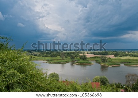 The Oder River on the border to Poland shortly before the beginning of a storm