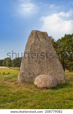 On top of the famous Inglinge grave mound in Smaland, in South Sweden, with its famous stone sphere in front of the standing stone.